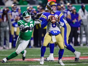 Winnipeg Blue Bombers quarterback Zach Collaros (8) looks to pass against the Saskatchewan Roughriders in the second half during the 2019 CFL Western Conference Final football game at Mosaic Stadium in Regina on Nov. 17, 2019. The Bombers won 20-13 to advance to the Grey Cup.