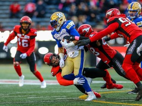 Winnipeg Blue Bombers Andrew Harris runs the ball against the Calgary Stampeders during CFL football in Calgary on Saturday, October 19, 2019. Harris has been name a CFL West Division All-Star. Al Charest/Postmedia