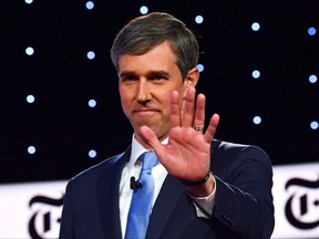 In this file photo taken Oct. 15, 2019, Democratic presidential hopeful and former Texas representative Beto O'Rourke waves as he arrives onstage for the fourth Democratic primary debate of the 2020 presidential campaign season at Otterbein University in Westerville, Ohio.