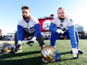 Winnipeg Blue Bombers L-R, Cody Speller and Drew Desjarlais during practice at McMahon stadium in preparation for the 107th Grey Cup in Calgary on Friday. Darren Makowichuk/Postmedia Network