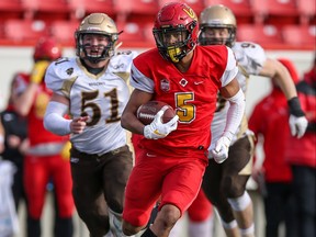 University of Calgary receiver Jalen Philpot returns a 97 yard punt to score a touchdown in the Dino's narrow 47-46 Hardy Cup victory defeating the University of Manitoba Bisons at McMahon Stadium on Saturday November 2, 2019.  SEAN LIBIN / SPECIAL FOR POSTMEDIA
