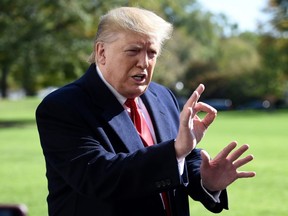 U.S. President Donald Trump talks to the media on the South Lawn upon his return to the White House by Marine One, in Washington, D.C., on Sunday, Nov. 3, 2019, after returning from a trip to New York.