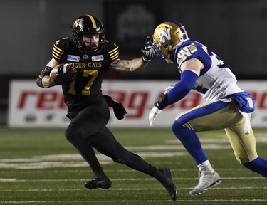 Nov 24, 2019; Calgary, Alberta, CAN; Hamilton Tiger-Cats wide receiver Luke Tasker (17) runs the ball in the second half during the 107th Grey Cup championship football game against the Winnipeg Blue Bombers at McMahon Stadium. Mandatory Credit: Eric Bolte-USA TODAY Sports