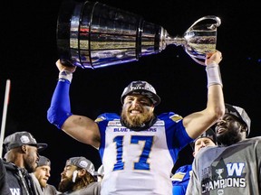 Blue Bombers quarterback Chris Streveler (17) celebrates their win over Hamilton Tiger-Cats during the 107th Grey Cup championship football game at McMahon Stadium.