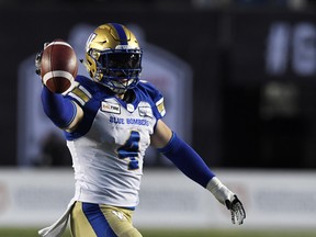 Winnipeg Blue Bombers linebacker Adam Bighill (4) celebrates after recovering a fumble against the Winnipeg Blue Bombers in the first half during the 107th Grey Cup championship football game at McMahon Stadium in Calgary on Nov. 24, 2019.