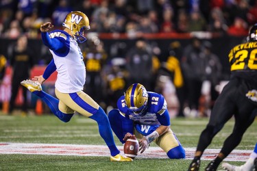 Nov 24, 2019; Calgary, Alberta, CAN; Winnipeg Blue Bombers kicker Justin Medlock (9) scores field goal against the Hamilton Tiger-Cats in the first half during the 107th Grey Cup championship football game at McMahon Stadium. Mandatory Credit: Sergei Belski-USA TODAY Sports