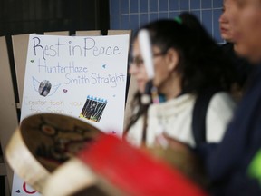 People drum at a vigil for Hunter Haze Straight-Smith, the three-year-old who was was allegedly stabbed as he slept, and taken off life support today, outside Winnipeg's Childrens Hospital on November 1, 2019.