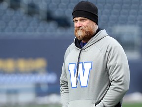 Head coach Mike O'Shea chills during Winnipeg Blue Bombers practice in Winnipeg on Wed., Nov. 13, 2019.