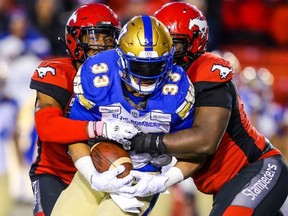 The Bombers and Stamps will battle in the West semifinal on Sunday. AL CHAREST/POSTMEDIA