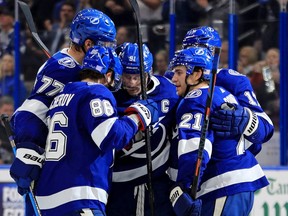 Tampa Bay Lightning players celebrate after one of the team's nine goals against the New York Rangers at Amalie Arena on Nov. 14, 2019 in Tampa. (MIKE EHRMANN/Getty Images)