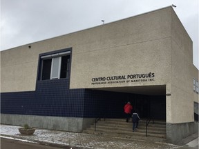 The exterior of the Portuguese Association of Manitoba cultural club in Winnipeg on Friday. A woman in her 30's and a teenage boy face armed robbery and other charges after attempting to rob the proceeds of the association's twice-weekly bingo on Halloween evening. Patrons stepped in and stopped the robbery and held the youth until police arrived.