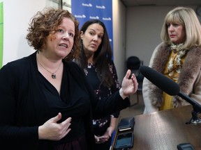 Nicole Chammartin (left), Klinic executive director, speaks while Laurel Centre executive director Heather Leeman (centre) and Cathy Cox, minister responsible for the status of women, listen following a press conference to announce a $2.4 million investment over three years for expanded walk-in mental health services and specialized trauma counselling, at Klinic Community Health on Portage Avenue in Winnipeg, on Mon., Nov. 4, 2019. Kevin King/Winnipeg Sun/Postmedia Network