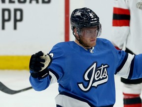 Winnipeg Jets centre Andrew Copp celebrates his second-period goal against the New Jersey Devils in Winnipeg on Tues., Nov. 5, 2019. Kevin King/Winnipeg Sun/Postmedia Network