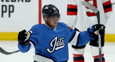 Winnipeg Jets centre Andrew Copp celebrates his second-period goal against the New Jersey Devils in Winnipeg on Tues., Nov. 5, 2019. Kevin King/Winnipeg Sun/Postmedia Network