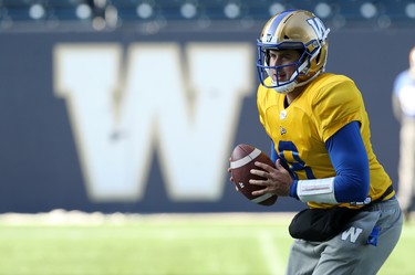 Quarterback Zach Collaros takes a snap during Winnipeg Blue Bombers practice on Wed., Nov. 6, 2019. Kevin King/Winnipeg Sun/Postmedia Network