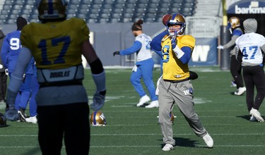 Quarterback Zach Collaros (right) throws with Chris Streveler during Winnipeg Blue Bombers practice on Wed., Nov. 6, 2019. Kevin King/Winnipeg Sun/Postmedia Network