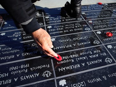 A poppy is laid on a memorial following the Royal Winnipeg Rifles Association Remembrance Day Service at Vimy Memorial Park in Winnipeg on Mon., Nov. 11, 2019. Kevin King/Winnipeg Sun/Postmedia Network