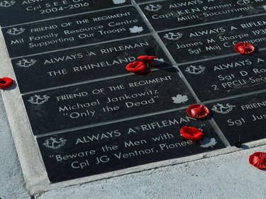 Poppies lay on a memorial following the Royal Winnipeg Rifles Association Remembrance Day Service at Vimy Memorial Park in Winnipeg on Mon., Nov. 11, 2019. Kevin King/Winnipeg Sun/Postmedia Network