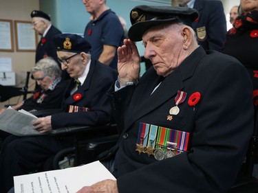 Veteran Ed Wirth salutes during The Last Post at a Remembrance Day service at Deer Lodge Centre in Winnipeg on Mon., Nov. 11, 2019. Kevin King/Winnipeg Sun/Postmedia Network