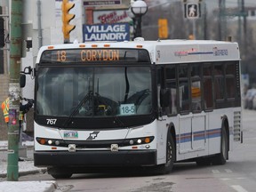 Winnipeg Transit bus stops at Confusion Corner.