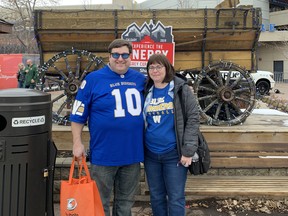 (Left to right) Long-time Winnipeg Blue Bombers fan Sean Brennan and his wife Joanne in their Bombers gear at Grey Cup festivities in Calgary on Saturday, Nov. 23, 2019. Sean and Joanne are in Calgary praying for some relief from the football gods and that the Bombers end the longest championship drought in the nine-team league when they take on the East Division champion Hamilton Tiger-Cats in the Grey Cup on Sunday, Nov. 24, 2019.