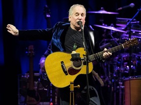 In this file photo taken on November 17, 2016 US singer Paul Simon performs on stage at the Bilbao Exhibition Centre in the Spanish Basque city of Barakaldo on November 17, 2016.