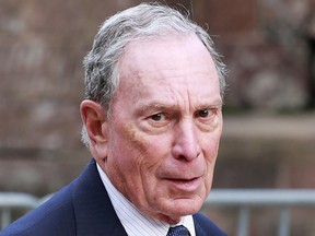 In this file photo taken on May 15, 2019, Michael Bloomberg arrives to the opening celebration of the Statue of Liberty Museum on Liberty Island at the Statue Cruises Terminal in Battery Park in New York.