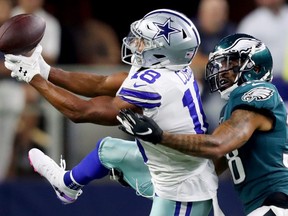 Cowboys receiver Randall Cobb (left) attempts to make a catch against the Eagles during first half NFL action in Arlington, Texas, on Oct. 20, 2019.