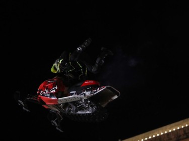 Daniel Shaffer performs during the aerial acrobatic snowmobile performance featuring X Games athletes during the Illuminate 150 event on the grounds of the Manitoba Legislative Building in Winnipeg, Man., on Saturday, Dec. 14, 2019. The Manitoba 150 host committee kicked off the 150-day countdown to Manitoba Day 2020 by flicking the switch to turn on 300,000 LED Christmas lights on the Manitoba Legislative Building and grounds.