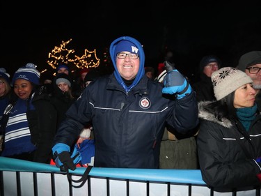 Gabriel Langlois, who is commonly known as Dancing Gabe, gives a thumbs up while attending the Illuminate 150 event on the grounds of the Manitoba Legislative Building in Winnipeg, Man., on Saturday, Dec. 14, 2019. The Manitoba 150 host committee kicked off the 150-day countdown to Manitoba Day 2020.