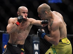 Marlon Moraes (red gloves) fights Jose Aldo (blue gloves) during UFC 245 at T-Mobile Arena in Las Vegas, Saturday, Dec. 14, 2019.
