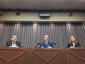 Auditor General of Manitoba Norm Ricard, centre, speaks as Deputy Auditor General Tyson Shtykalo, left, and Director of Performance Audit Melissa Emslie, look on in Winnipeg on Friday, November 22, 2019. Ricard says the province's oversight of large trucks and other commercial vehicles is "inadequate".