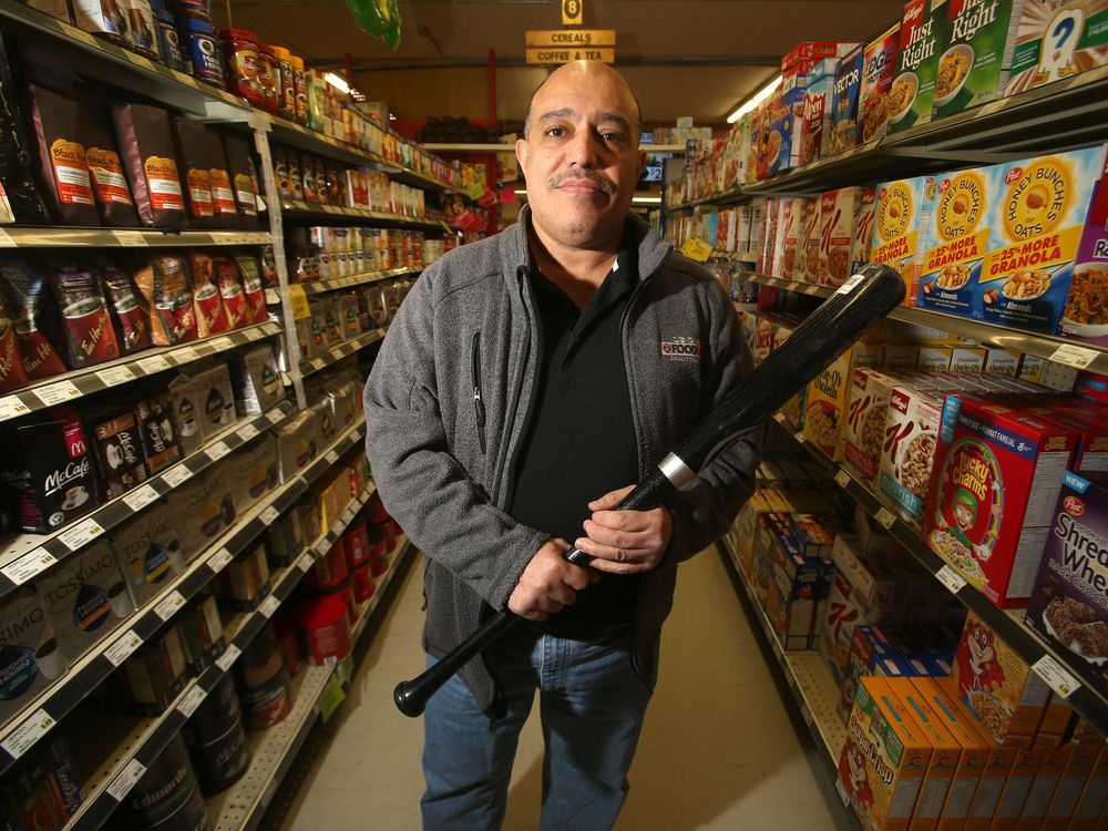 Baseball bats providing security for Food Fare stores Winnipeg Sun