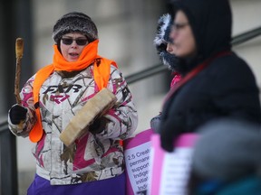 The Indigenous Women and Girls Manitoba Coalition rallied on the steps of the Manitoba Legislative Building, in Winnipeg Friday.