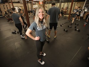 Megan Maes,, founder and head coach of Norak CrossFit. in her gym in Winnipeg. Maes is participating in an event raising pledges and awareness for Special Olympics.