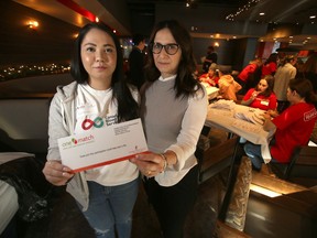 Adrienne San Juan, stem cell territory manager, Canadian Blood Services (left) with Theresa Cianflone, in Winnipeg. Cianflone is looking for a matching stem cell donor, she has a rare blood disorder that has seriously impacted her health