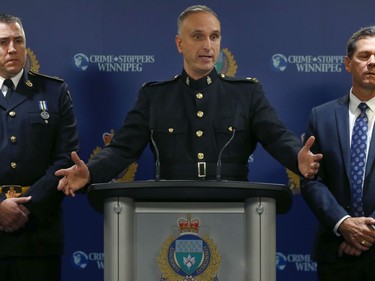 Insp. Max Waddell (centre) of the Winnipeg Police Service organized crime unit, along with Det. Insp. Jim Walker (left) the deputy director of the Ontario Provincial Police central organized crime enforcement bureau, and Ron Bell, supervisor of the special investigations unit for Manitoba Finance and Taxation, speak to media about Project Highland at WPS headquarters on Mon., Dec. 23, 2019. Kevin King/Winnipeg Sun/Postmedia Network