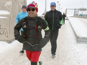 Junel Malapad pounds the pavement during his Boxing Day run to raise funds for Silaom Mission, in Winnipeg.