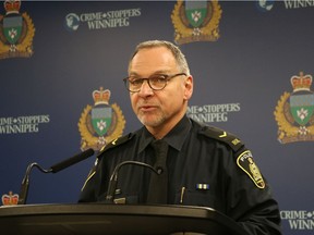 Winnipeg Police Service spokesperson Const. Rob Carver, addresses the media regarding the Christmas morning homicide of Gordon Edward Pache, 37, on Friday at the WPS Headquarters.