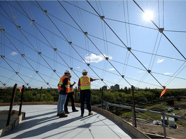 Margaret Redmond, president/CEO of the Assiniboine Park Conservancy speaks with board members on a canopy walkway about six storeys above ground during a media tour of the Leaf, part of Canada's Diversity Gardens, at Assiniboine Park in Winnipeg on Tues., Aug. 20, 2019. Kevin King/Winnipeg Sun/Postmedia Network ORG XMIT: POS1908201418403541