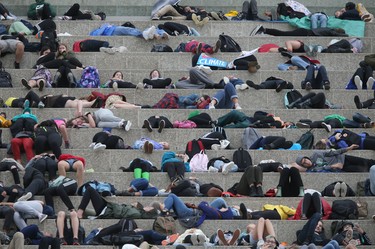 Climate change activists in numerous cities across Canada pretended to drop dead at the same time.  This group played dead on the steps of the Canadian Museum for Human Rights. Friday, September 20/2019 Winnipeg Sun/Chris Procaylo/stf