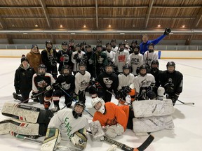 Dr. Tony Krawat organized a pair of hockey games to raise money for the Christmas Cheer Board. These are the players from the youth game.
Handout