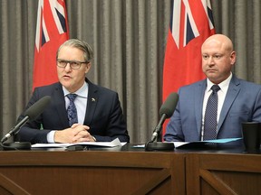 Manitoba Heath, Seniors and Active Living Minister Cameron Friesen and Manitoba Chief Medical officer Dr. Brent Roussin address the media regarding the novel coronavirus on Tuesday, Jan. 28, 2020. Josh Aldrich/Winnipeg Sun/Postedia