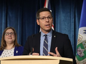 Mayor Brian Bowman addresses the media on the release of the Interim Phosphorous Reduction and Nutrient Removal Implementation Plan as Manitoba Conservation and Climate Minister Sarah Guillemard looks on on Friday at City Hall.