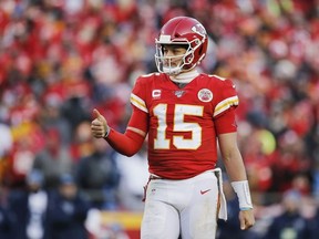 Patrick Mahomes of the Kansas City Chiefs reacts after a play in the second half against the Tennessee Titans in the AFC Championship Game at Arrowhead Stadium on January 19, 2020 in Kansas City, Missouri.