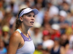 Caroline Wozniacki of Denmark looks on during her Women's Singles third round match against Ons Jabeur of Tunisia on day five of the 2020 Australian Open at Melbourne Park on January 24, 2020 in Melbourne, Australia.
