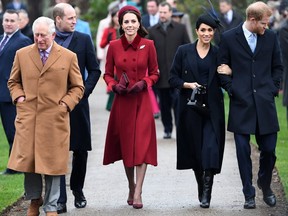 In this file photo taken on Dec. 25, 2018, (L-R) Britain's Prince Charles, Prince of Wales; Prince William, Duke of Cambridge; Catherine, Duchess of Cambridge; Meghan, Duchess of Sussex; and Prince Harry, Duke of Sussex arrive for a Christmas Day service in Norfolk, Britian. (AFP/Getty Images)