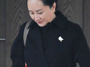 Huawei Chief Financial Officer Meng Wanzhou leaves her Vancouver home to go to her extradition hearing in Vancouver on Jan. 22, 2020. (AFP)