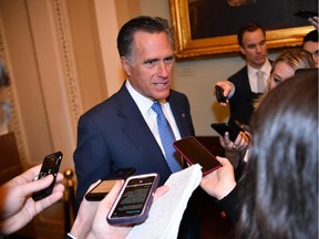 Republican Sen. Mitt Romney speaks to reporters as he arrives for the Senate impeachment trial of US President Donald Trump at the US Capitol in Washington, DC, January 21.