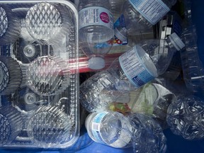 Plastics are seen being gathered for recycling at a depot in North Vancouver on June, 10, 2019. Environment Canada is releasing scientific evidence today to back up the government's bid to ban most single-use plastics next year. Prime Minister Justin Trudeau announced last June the government was getting ready to prohibit the production and sale of single-use plastics in Canada, such as drinking straws, takeout containers and plastic cutlery.